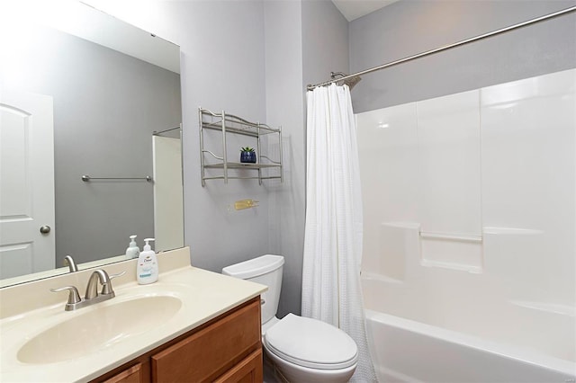 full bathroom featuring toilet, vanity, and shower / tub combo