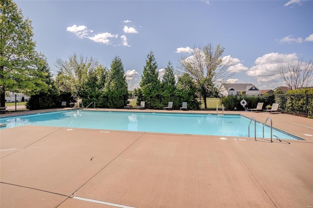 view of swimming pool featuring a patio