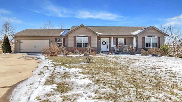 single story home featuring a garage