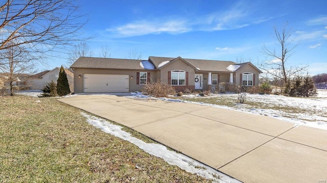 single story home featuring a garage