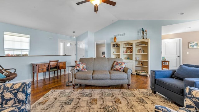 living room with ceiling fan, lofted ceiling, and dark hardwood / wood-style flooring