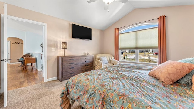 bedroom with ceiling fan and vaulted ceiling