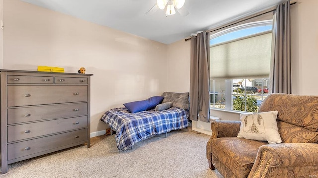 carpeted bedroom featuring ceiling fan