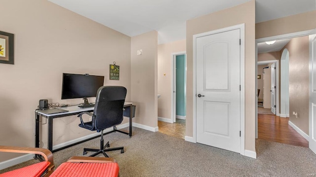 home office featuring carpet floors