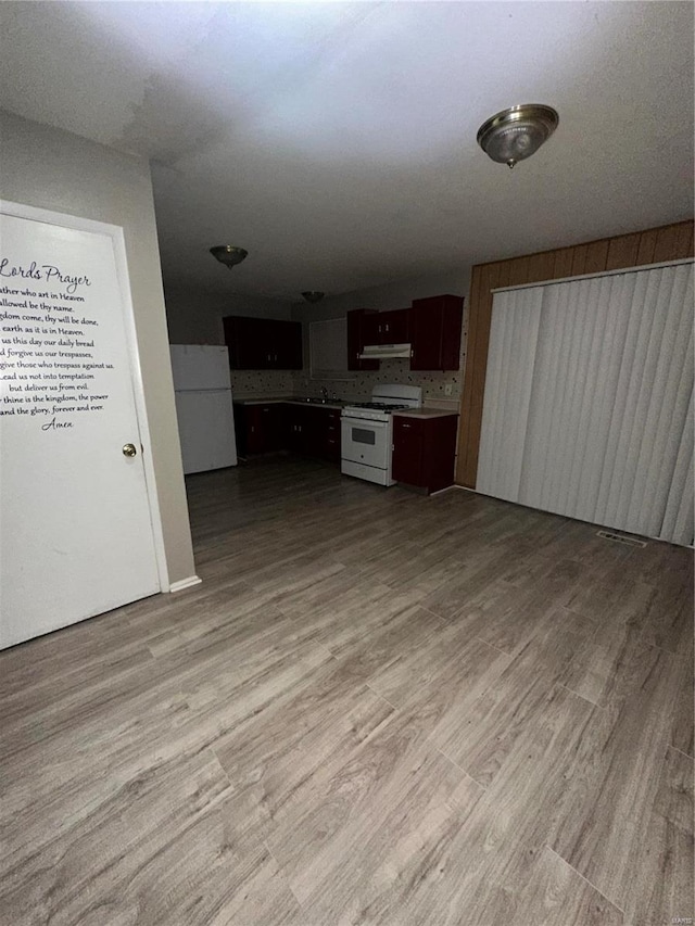 interior space with sink and light hardwood / wood-style floors