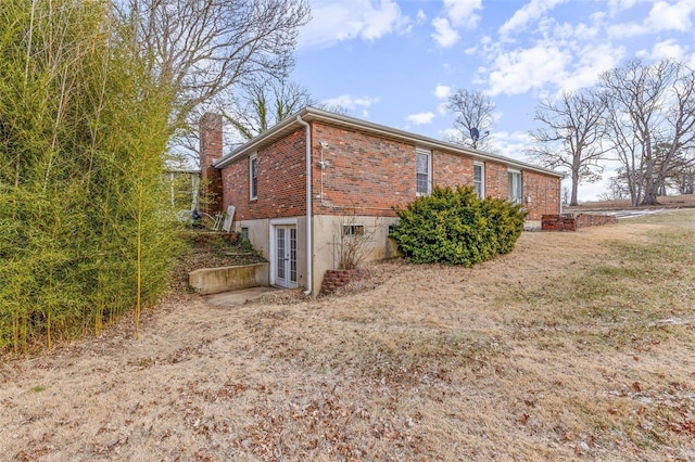 view of side of home with french doors