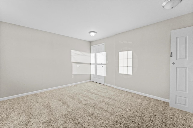 empty room featuring carpet flooring