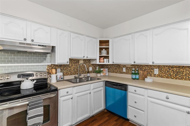 kitchen with white cabinets, backsplash, and appliances with stainless steel finishes