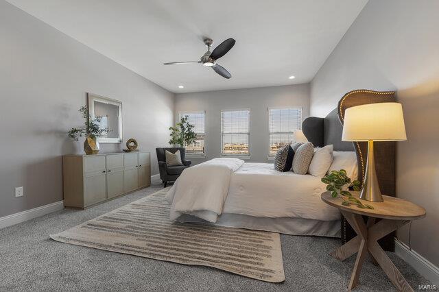 carpeted bedroom featuring ceiling fan