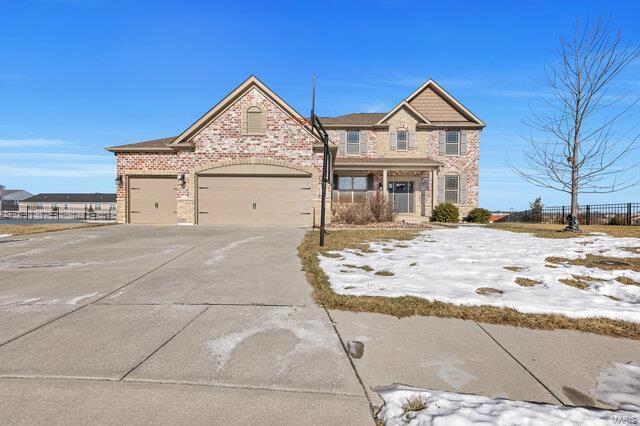 view of front of property featuring a garage