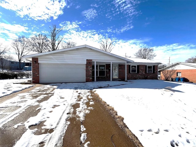 single story home featuring a garage