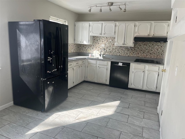 kitchen with a sink, black appliances, white cabinets, and under cabinet range hood