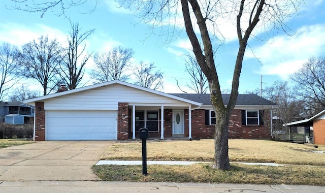 single story home featuring brick siding, a front lawn, concrete driveway, a chimney, and a garage