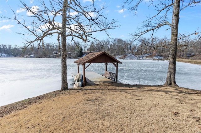 dock area featuring a lawn