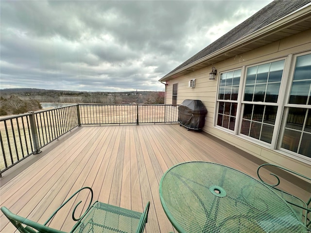 wooden deck with area for grilling