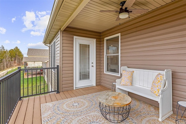 wooden terrace with ceiling fan