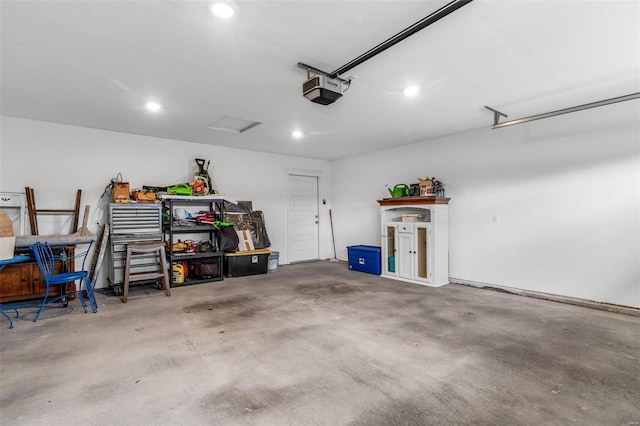 garage featuring a garage door opener