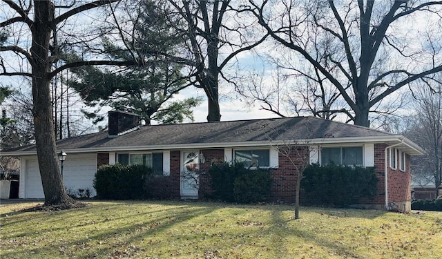 ranch-style house with driveway, a garage, brick siding, a chimney, and a front yard