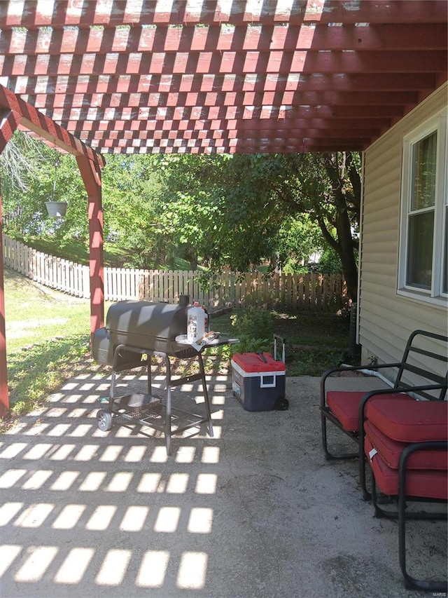 view of patio with a pergola and grilling area