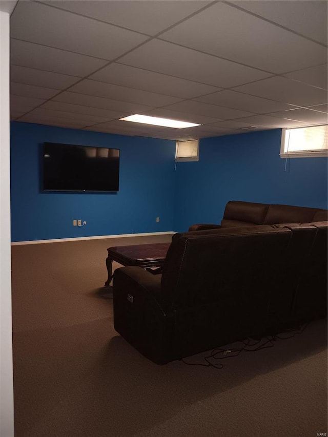 living room with carpet flooring and a drop ceiling