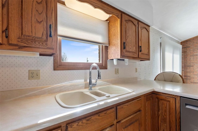 kitchen featuring sink and stainless steel dishwasher