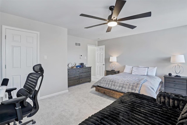 carpeted bedroom with ceiling fan