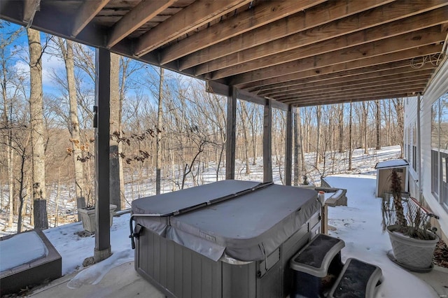 exterior space featuring a hot tub