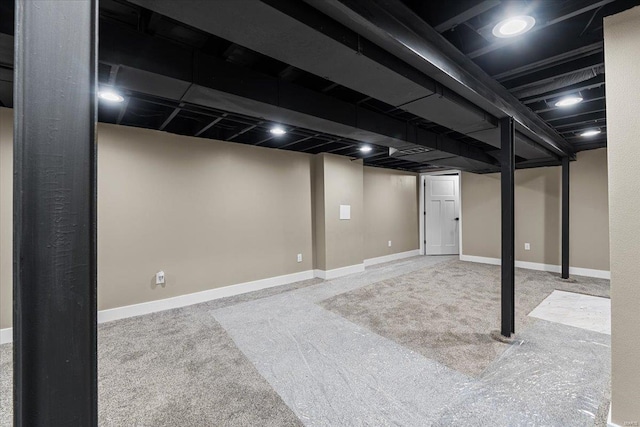 basement featuring carpet flooring