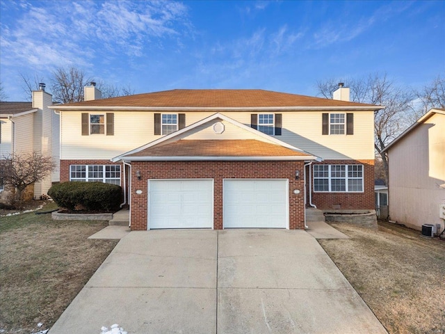 front facade with a garage