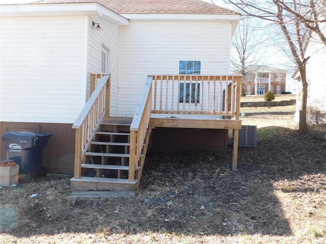 wooden terrace featuring stairs