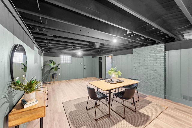 dining area with light hardwood / wood-style flooring