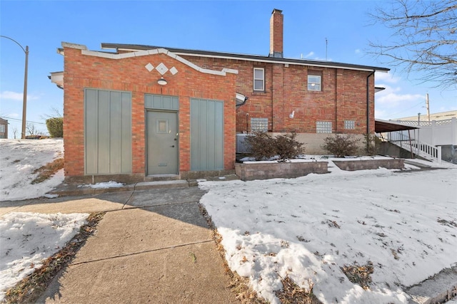 view of snow covered property