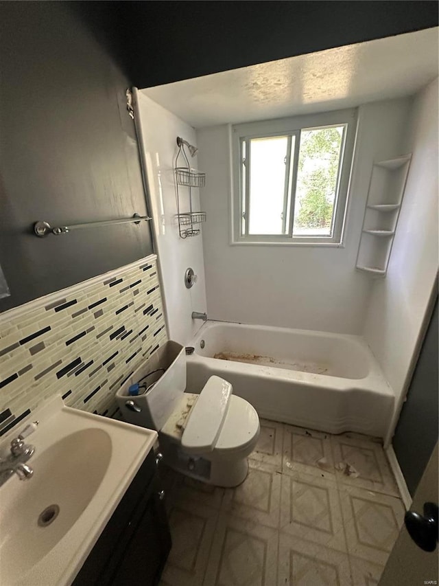 full bathroom featuring decorative backsplash, shower / bathing tub combination, toilet, and vanity