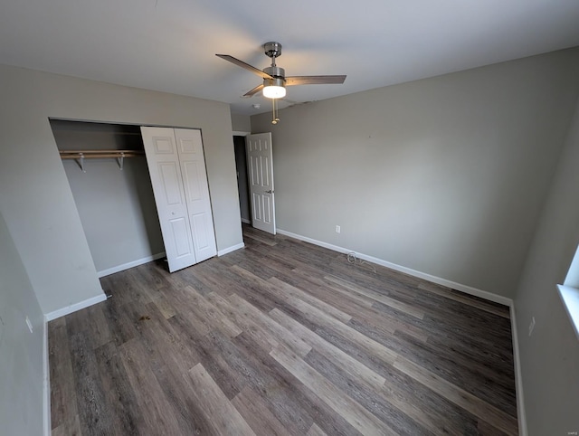 unfurnished bedroom featuring a closet, ceiling fan, and wood-type flooring