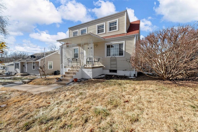 view of front facade with a front yard