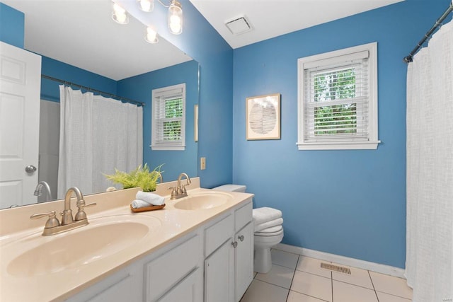 full bathroom with visible vents, a sink, baseboards, and toilet