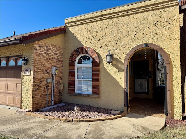 property entrance with a garage