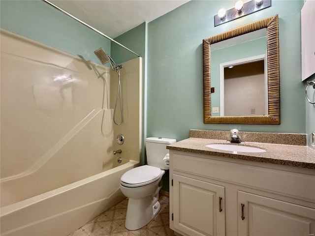 full bathroom featuring bathing tub / shower combination, vanity, and toilet