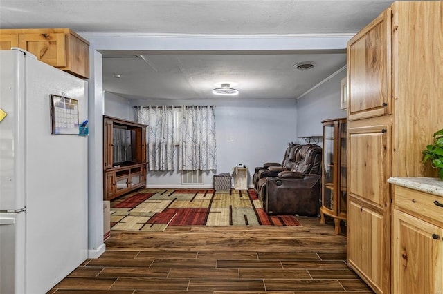 living area featuring ornamental molding