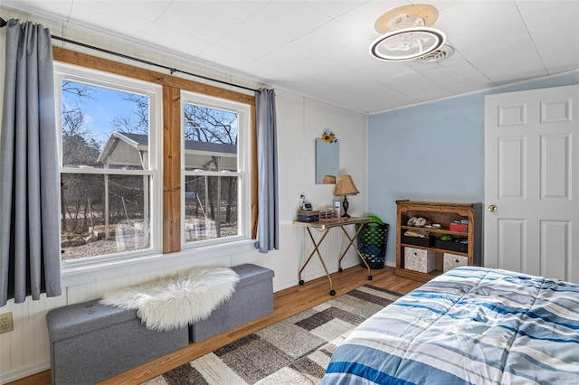 bedroom with hardwood / wood-style floors