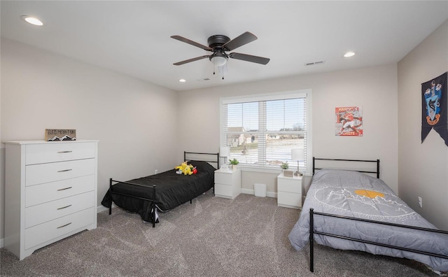 bedroom with light carpet and ceiling fan