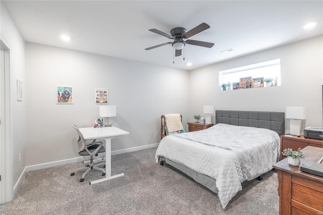 carpeted bedroom with ceiling fan