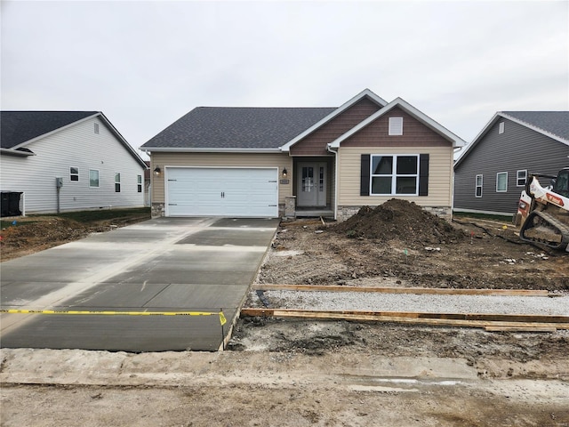 view of front of house with a garage