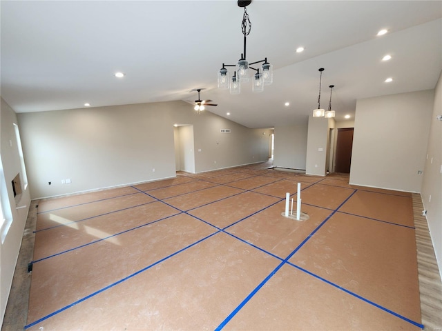 unfurnished living room featuring ceiling fan and lofted ceiling