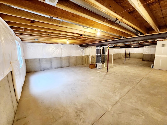 basement featuring heating unit