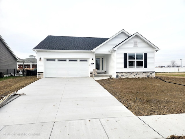 ranch-style home featuring a garage