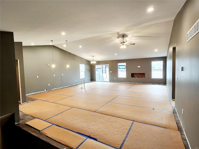 interior space with ceiling fan