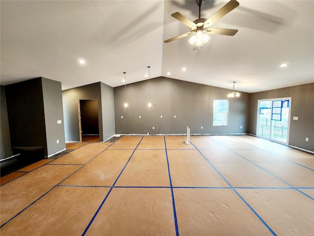 unfurnished room featuring ceiling fan and lofted ceiling