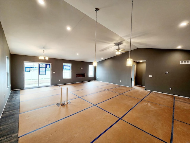 interior space featuring vaulted ceiling and ceiling fan