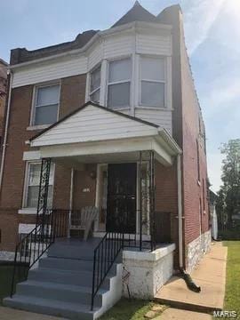 view of front of home featuring covered porch